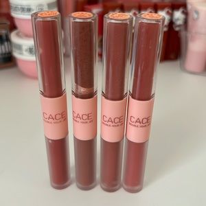 Set of double ended lip gloss and tint.